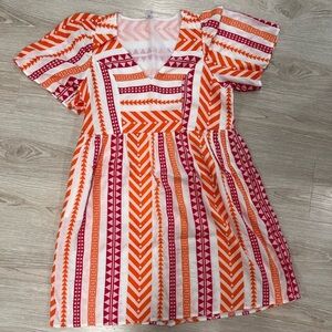 Vibrant Orange and Red Patterned Dress